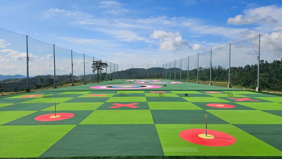 Golfer practicing with PureStrike Golf training equipment